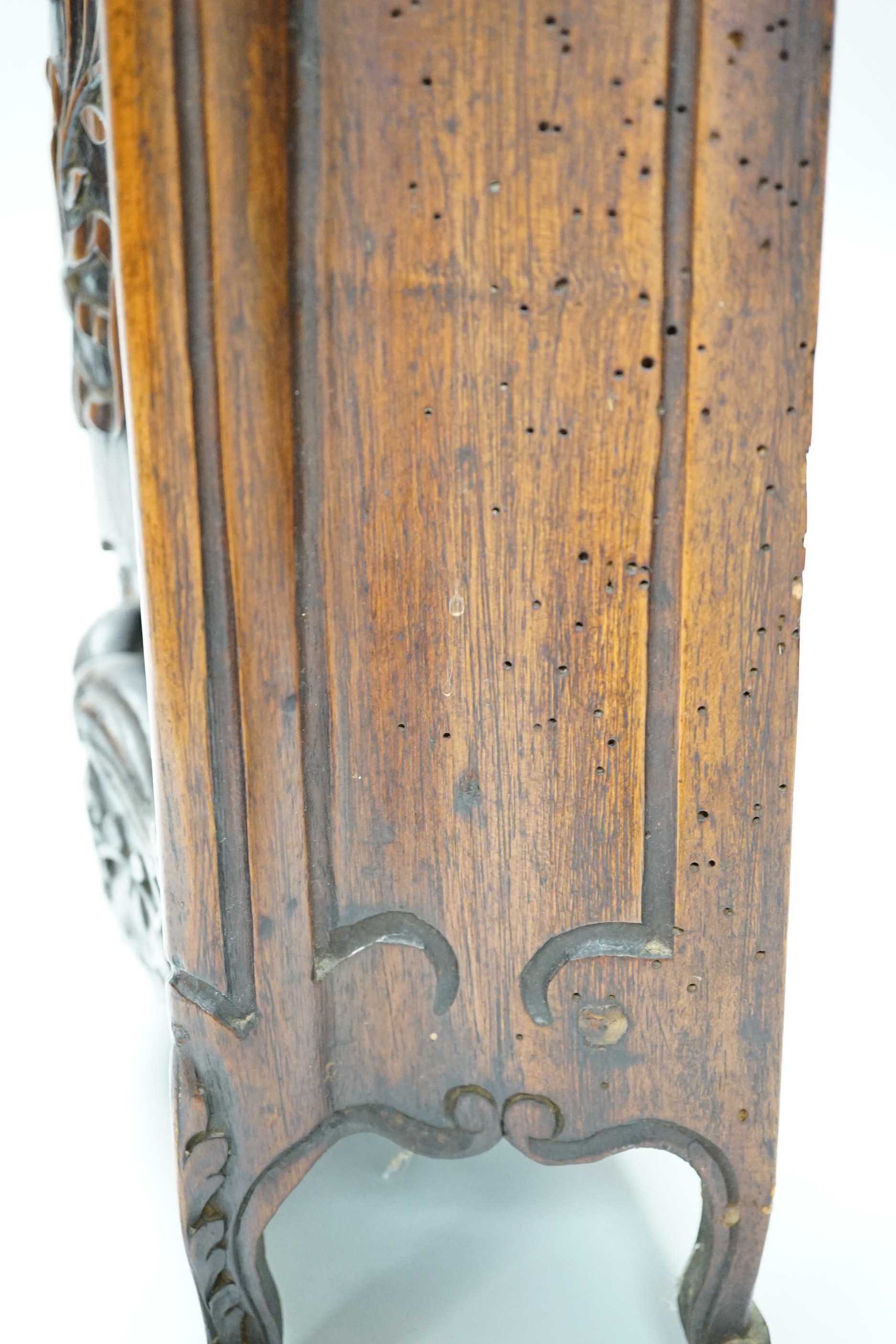 An 18th century French carved walnut miniature armoire/hutch with sliding front panel, 50cm high